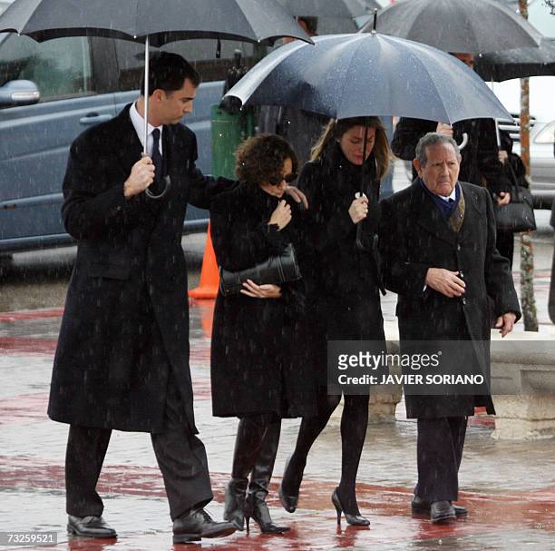 Spain's Prince Felipe, Paloma Rocasolano, Princess Letizia and Francisco Rocasolano arrive for the funeral of Erika Ortiz at the cemetery at Tres...