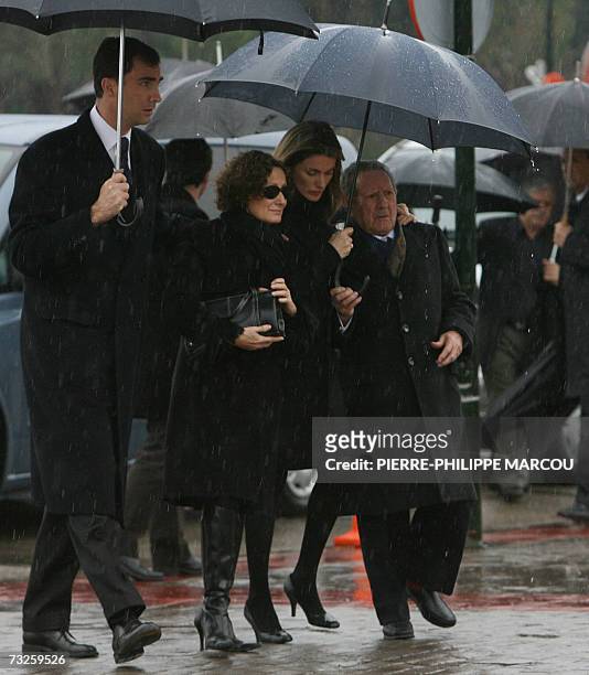 Spain's Prince Felipe, Paloma Rocasolano, Princess Letizia and Francisco Rocasolano arrive for the funeral of Erika Ortiz at the cemetery at Tres...