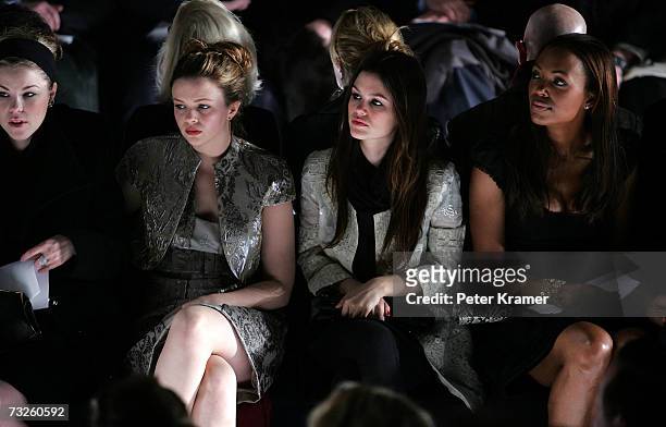 Actresses Amber Tamblyn, Rachel Bilson and Aisha Tyler sit in the front row at the Badgley Mischka Fall 2007 fashion show during Mercedes-Benz...
