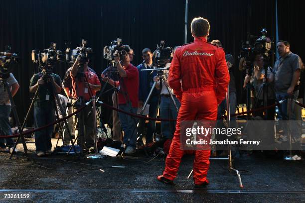 Dale Earnhardt Jr., driver of the Budweiser Chevrolet, speaks with members of the media during the NASCAR media day at Daytona International Speedway...