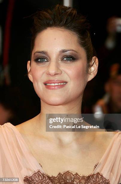 Actress Marion Cotillard arrives to attend 'La Vie en Rose' Premiere and the Opening Night of the 57th Berlin International Film Festival on February...