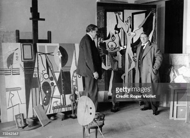 Pablo Picasso , Spanish painter and sculptor poses in his studio in 1922 Paris, France.