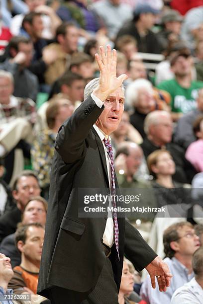 Head coach Jerry Sloan of the Utah Jazz signals a play during the NBA game against the Dallas Mavericks at EnergySolutions Arena on January 9, 2007...