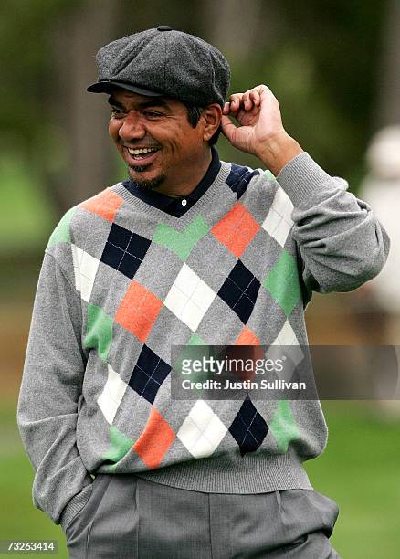 Actor George Lopez smiles on the first green of Spyglass Hill Golf Course during the first round of the AT&T Pebble Beach National Pro-Am February 8,...