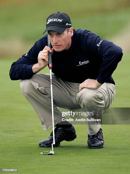 Jim Furyk lines up his putt on the 2nd green of Spyglass Hill Golf Course during the first round of the AT&T Pebble Beach National Pro-Am February 8,...