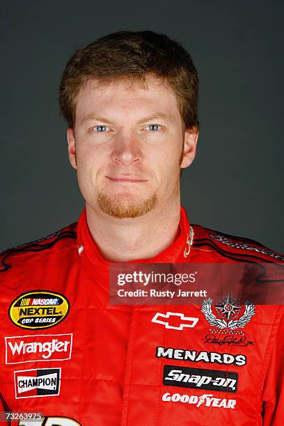 Dale Earnhardt Jr., driver of the Budweiser Chevrolet, poses during the NASCAR media day at Daytona International Speedway on February 8, 2007 in...