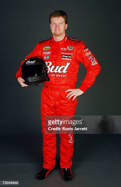Dale Earnhardt Jr., driver of the Budweiser Chevrolet, poses during the NASCAR media day at Daytona International Speedway on February 8, 2007 in...