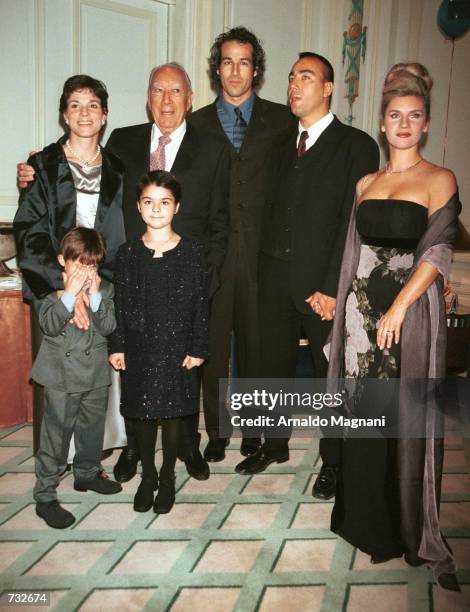 Anthony Quinn, second from left in back row, along with his family, wife Kathy Quinn, left, son Jeb, third from left, son Lorenzo, fourth from left...