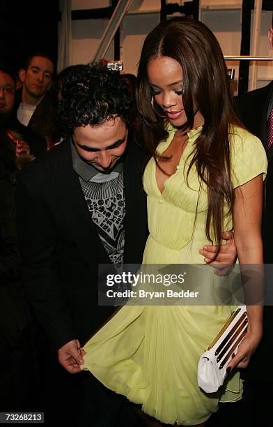 Designer Zac Posen and singer Rihanna pose backstage at the Zac Posen Fall 2007 fashion show during Mercedes-Benz fashion Week at The Tent in Bryant...