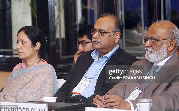 Editors of Pakistan's national newspapers Rehana Hakeem of Newsline, Najam Sethi of Daily Times and Mehmood Shaam of Jang listen to Indian Foreign...