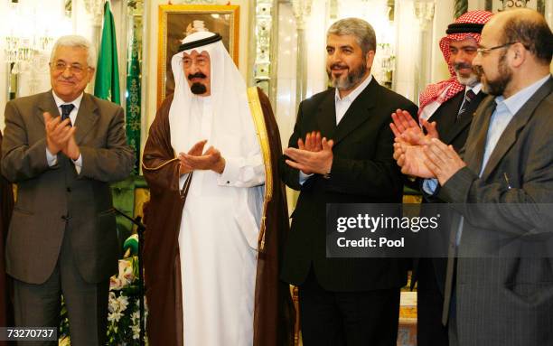 King Abdullah of Saudi Arabia Palestinian President Mahmoud Abbas Hamas leader Khaled Meshaal and Prime Minister Ismail Haniyeh pose after talks on...