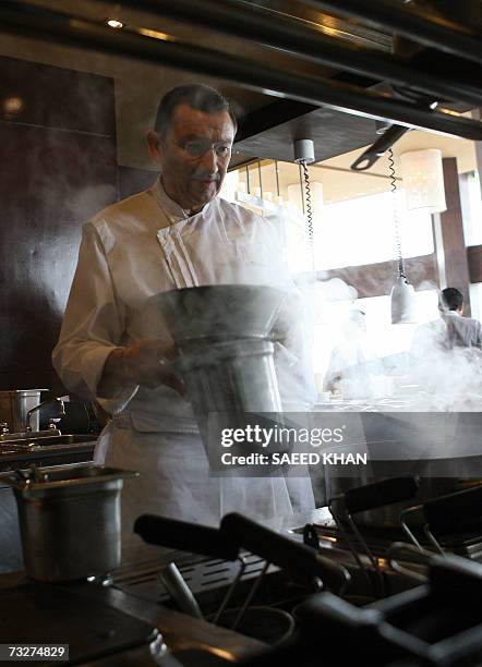 Michelin three star chef Antoine Westerman from France prepares lunch at the Mezzaluna resturant in Bangkok, 08 February 2006. Foodies are flying in...
