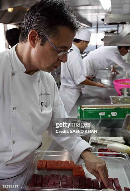 Michelin three star chef Jean-Michel Lorain from France prepares lunch at the Mezzaluna resturant in Bangkok, 08 February 2006. Foodies are flying in...