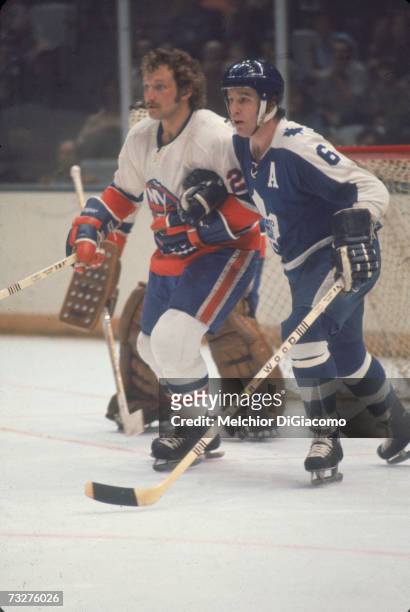 Canadian professional ice hockey player Ron Ellis of the Toronto Maple Leafs on the ice during a road game against the New York Islanders, including...