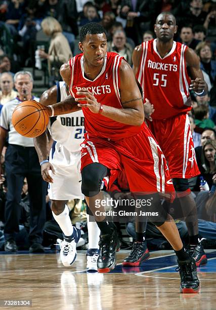 Tracy McGrady of the Houston Rockets dribbles up the court looking to initiate the offense against the Dallas Mavericks on February 9, 2007 at the...