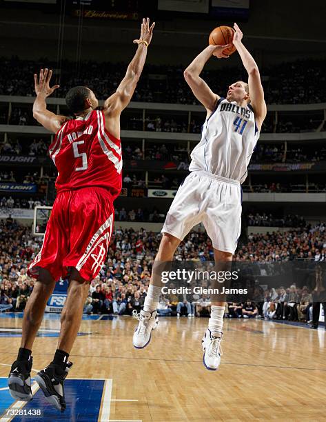 Dirk Nowitzki of the Dallas Mavericks shoots the jumper over Juwan Howard of the Houston Rockets on February 9, 2007 at the American Airlines Center...