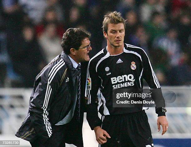 Real Madrid's manager Fabio Capello instructs David Beckham during the La Liga match between Real Sociedad and Real Madrid at the Anoeta stadium on...