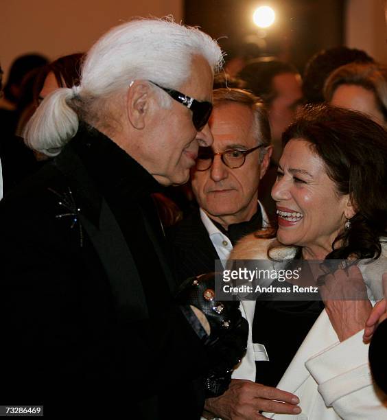 Karl Lagerfeld is greated by Hannelore Elsner during the Lagerfeld Confidential Party during the 57th Berlin International Film Festival on February...