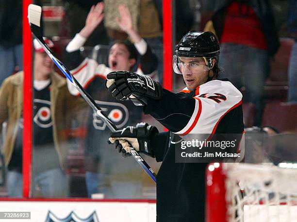 Simon Gagne of the Philadelphia Flyers celebrates his overtime goal against the St. Louis Blues on February 10, 2007 at the Wachovia Center in...
