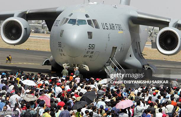 Made Boeing Globemaster is looked at by a crowd of visitors during the final day of the Aero India 2007 at the Yelahanka Air Force Station in...
