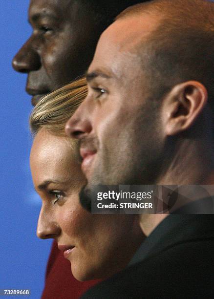 German born actress Diane Kruger poses with British actor Joseph Fiennes and US actor Dennis Haysbert during the photocall of the movie "Goodbye...
