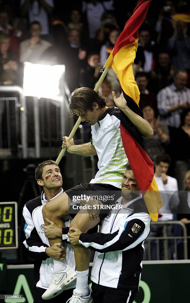 Germany's Tommy Haas (C) celebrates with...