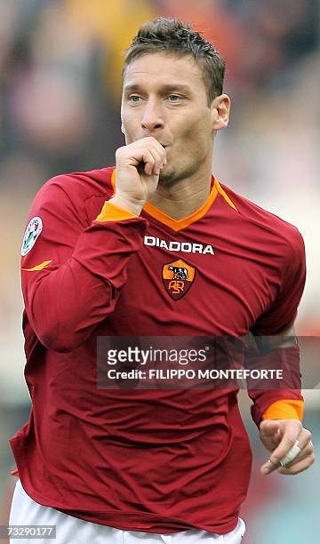 Roma's forward Francesco Totti jubilates after scoring against Parma during their Italian serie A football match at Rome's Olympic stadium , 11...