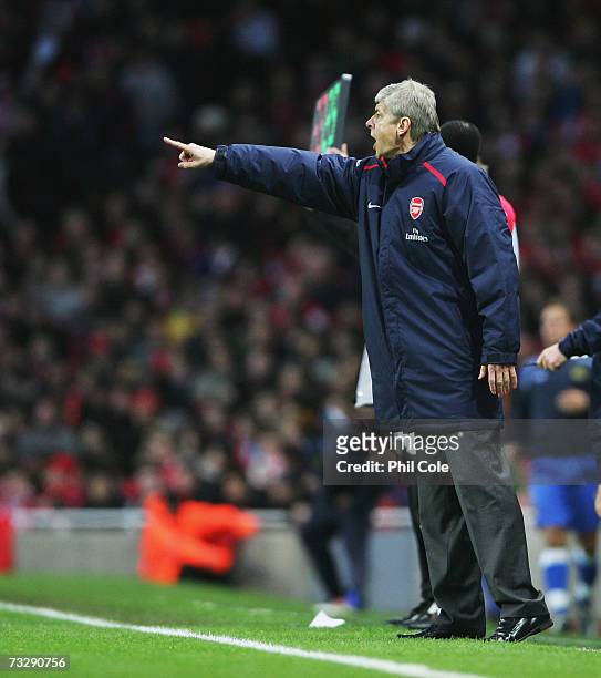 Arsenal manager Arsene Wenger gestures during the Barclays Premiership match between Arsenal and Wigan at the Emirates Stadium on February 11, 2007...