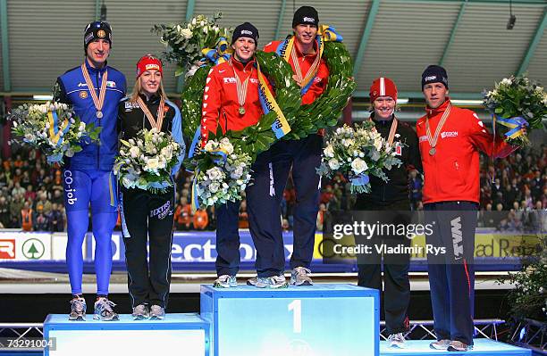 Enrico Fabris of Italy and Anni Friesinger of Germany , Ireen Wust and Sven Kramer of Netherlands , Cindy Klassen of Canada and Carl Verheijen of...