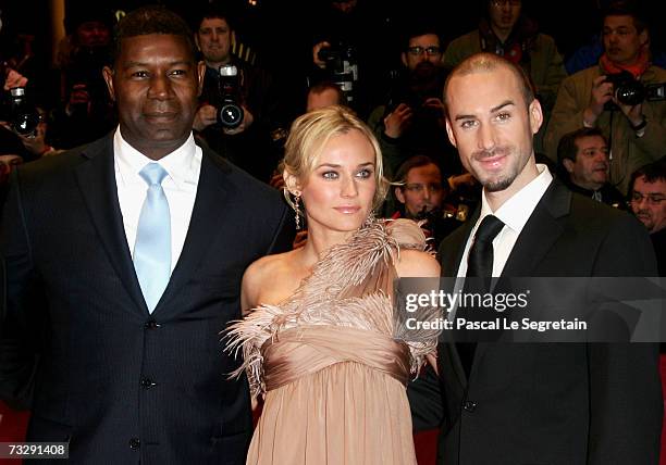 Actor Dennis Haysbert , Actress Diane Kruger and Actor Joseph Fiennes , pose as they arrive to attend the premiere to promote the movie 'Goodbye...