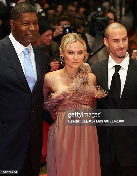 Actor Dennis Haysbert, German born actress Diane Kruger and British actor Joseph Fiennes pose on the red carpet as they arrive for the premiere of...