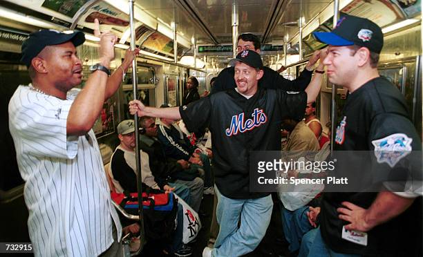 On the eve of the first New York "Subway Series" in 44 years, Yankees and Mets fans exchange words on the number 4 subway train October 21, 2000 en...