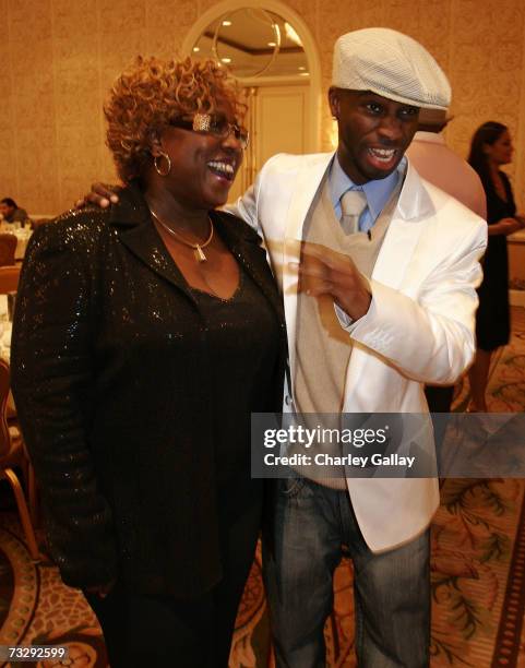 Music Producer Bryan-Michael Cox and his mother Pamela Cox share a laugh at Music Producer Bryan-Michael Cox's 3rd Annual Grammy Brunch at the Four...