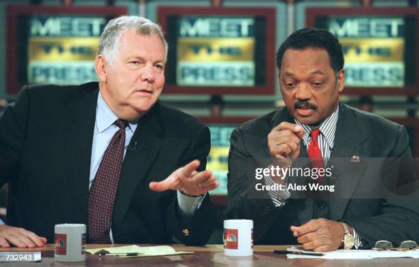 Rainbow/PUSH Coalition president and founder Reverend Jesse Jackson, right, discusses the Campaign 2000 with Republican activist William Bennett on...