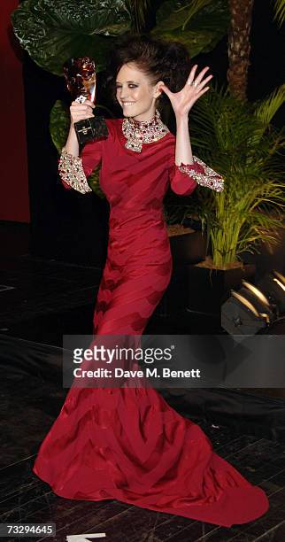 Actress Eva Green poses with the Orange Rising Star Award in the awards room at the Orange British Academy Film Awards, at the Royal Opera House on...