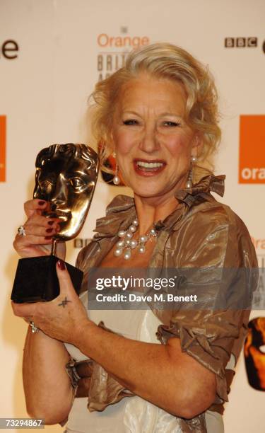 Actress Helen Mirren poses with the Best Actress Award in the awards room at the Orange British Academy Film Awards, at the Royal Opera House on...