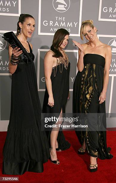 Musicians Emily Robinson, Natalie Maines and Martie Maguire of the group The Dixie Chicks arrives at the 49th Annual Grammy Awards at the Staples...