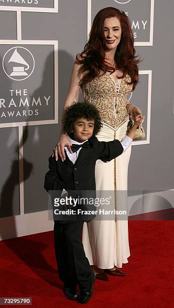 Tomi Rae Hynie, widow of James Brown and son James Brown Jr. Arrive at the 49th Annual Grammy Awards at the Staples Center on February 11, 2007 in...