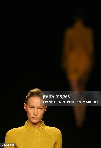 Model displays an outfit by Spanish designer Miriam Orcariz, part of her Fall/Winter 2007 collection at Madrid fashion week, 12 February 2007. AFP...