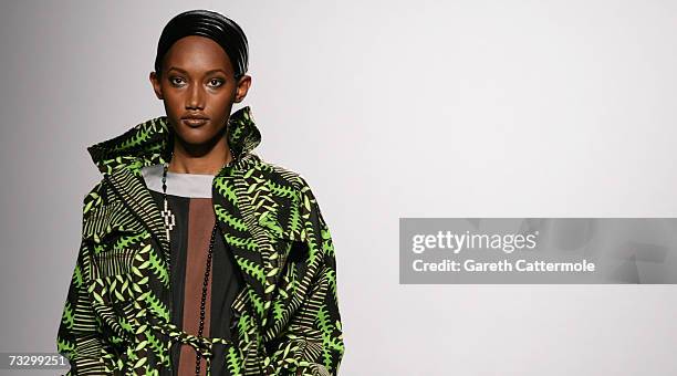 Model walks down the catwalk during the Duro Olowu Autumn/Winter 2007 show during London Fashion Week on February 12, 2007 in London, England.