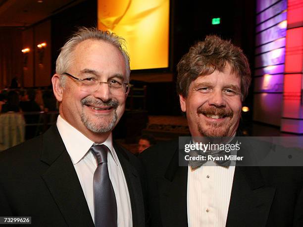 Presenter John Sacret Young with Paddy Chayefsky Laurel Award recipient John Wells at the 2007 Writers Guild Awards held at the Hyatt Regency Century...