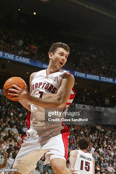 Andrea Bargnani of the Toronto Raptors rebounds the ball against the Minnesota Timberwolves during their game on December 27, 2006 at the Air Canada...