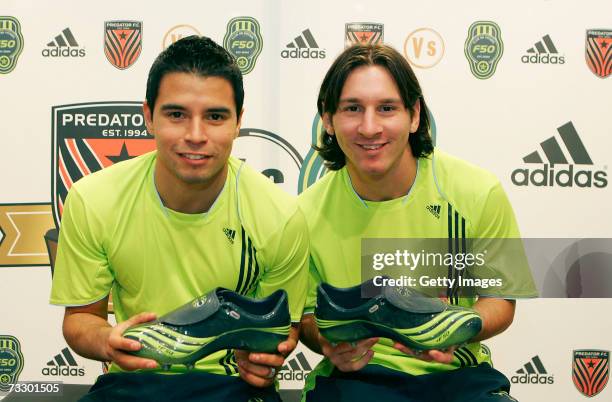 Lionel Messi and Javier Saviola present the new Adidas F-50 boots at the Adidas Barcelona store on February 12, 2007 in Barcelona, Spain.