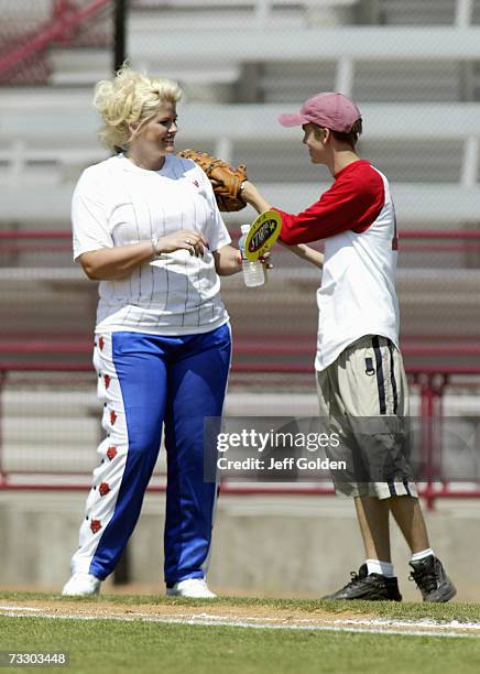 Anna Nicole Smith and son Daniel Wayne Smith participate in a charity softball game on June 30, 2002 at Dedeaux Field in Los Angeles, California.