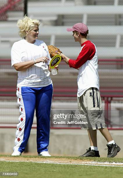 Anna Nicole Smith and son Daniel Wayne Smith participate in a charity softball game on June 30, 2002 at Dedeaux Field in Los Angeles, California.