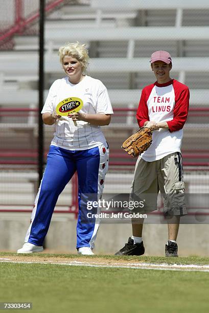 Anna Nicole Smith and son Daniel Wayne Smith participate in a charity softball game on June 30, 2002 at Dedeaux Field in Los Angeles, California.