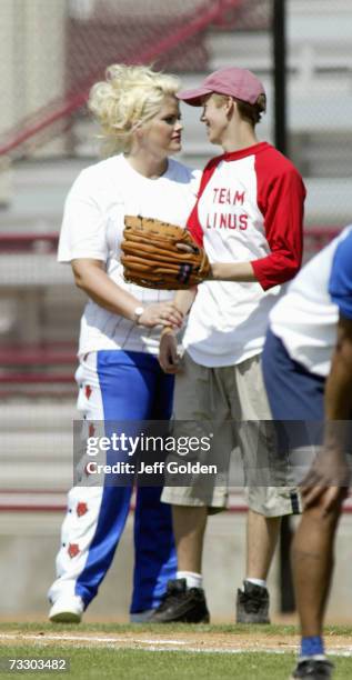 Anna Nicole Smith and son Daniel Wayne Smith participate in a charity softball game on June 30, 2002 at Dedeaux Field in Los Angeles, California.