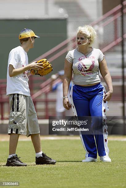 Anna Nicole Smith and son Daniel Wayne Smith participate in a charity softball game on June 30, 2002 at Dedeaux Field in Los Angeles, California.