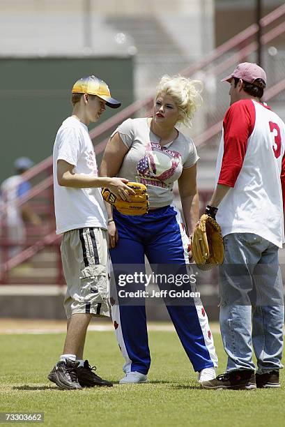 Anna Nicole Smith, son Daniel Wayne Smith and Howard K. Stern participate in a charity softball game on June 30, 2002 at Dedeaux Field in Los...