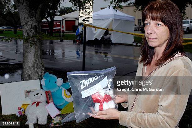 Teresa Rubinfield, a fan of Anna Nicole Smith, brings a little teddy bear inside a ziplock bag that says, Anna & Daniel, Rest in Peace, to a...